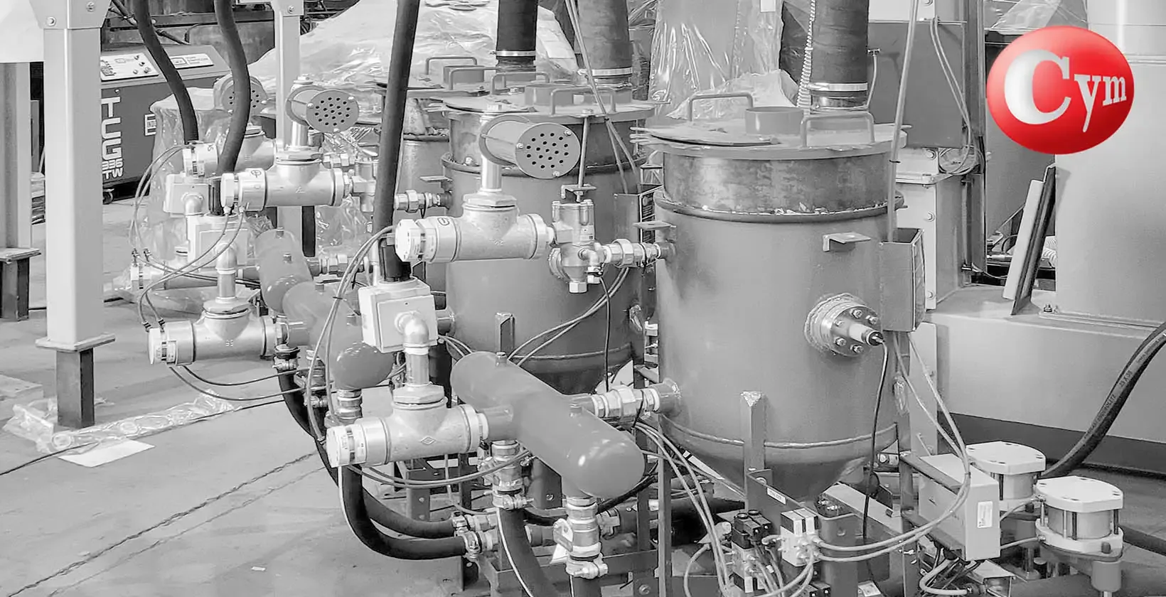 CYM 70-litre blast pots integrated in automatic shot peening machine — pneumatic abrasive manifold collector assembly