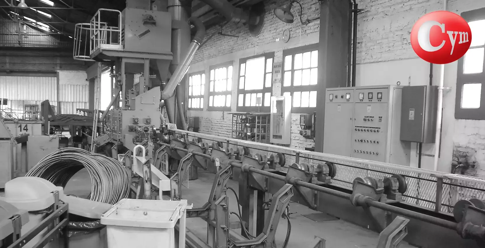 CYM BAR 3 continuous bar blaster – 3 blast wheels 40 HP at 120° – bar processing line with infeed conveyor · Sipar Aceros Gerdau, Argentina