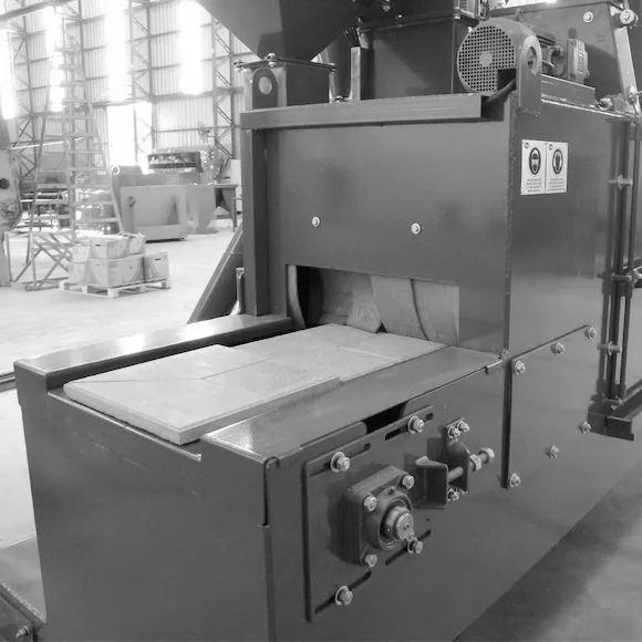 Shot blasting natural stone and concrete for texture