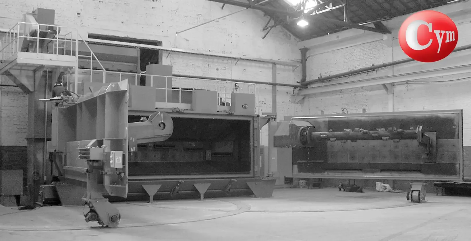 CYM COIL 4 blast machine – open cabinet, empty mandrel with pneumatic pivot and wear liner · Açosvic Ltda, Brazil