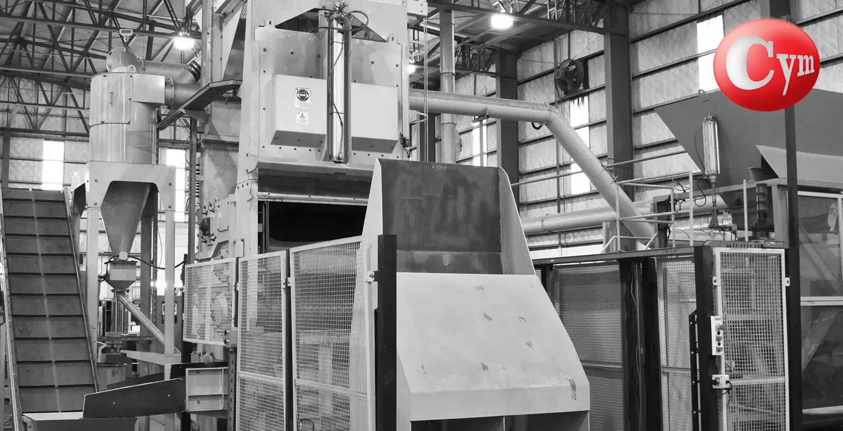 CYM LT 600 tumble belt blaster – 2 blast wheels 30 HP, hydraulic parts loader and discharge conveyor – complete installation for forged steel parts