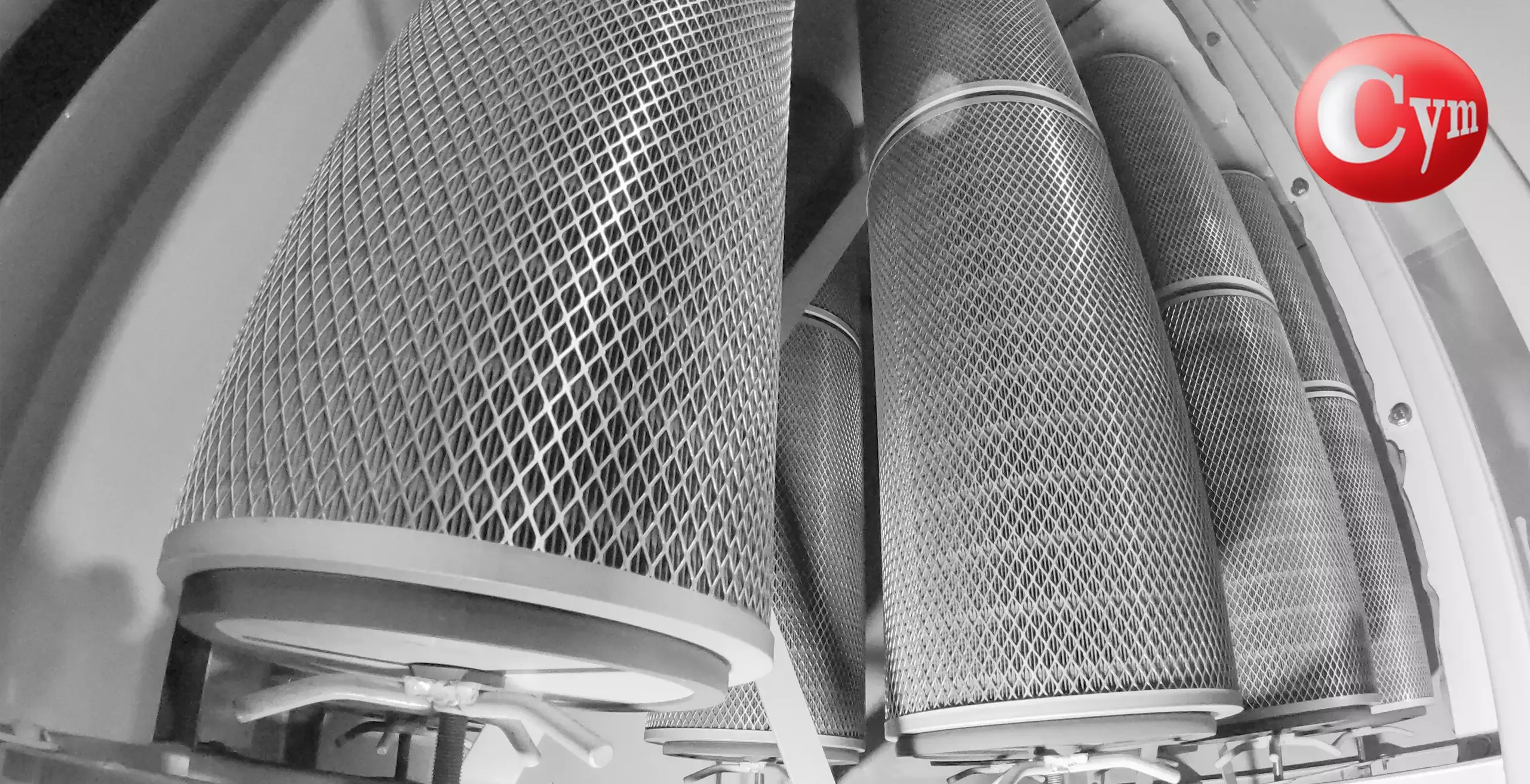 Interior view of vertical cartridges inside CYM CART24V dust collector — FAT test — CYM Materiales Argentina