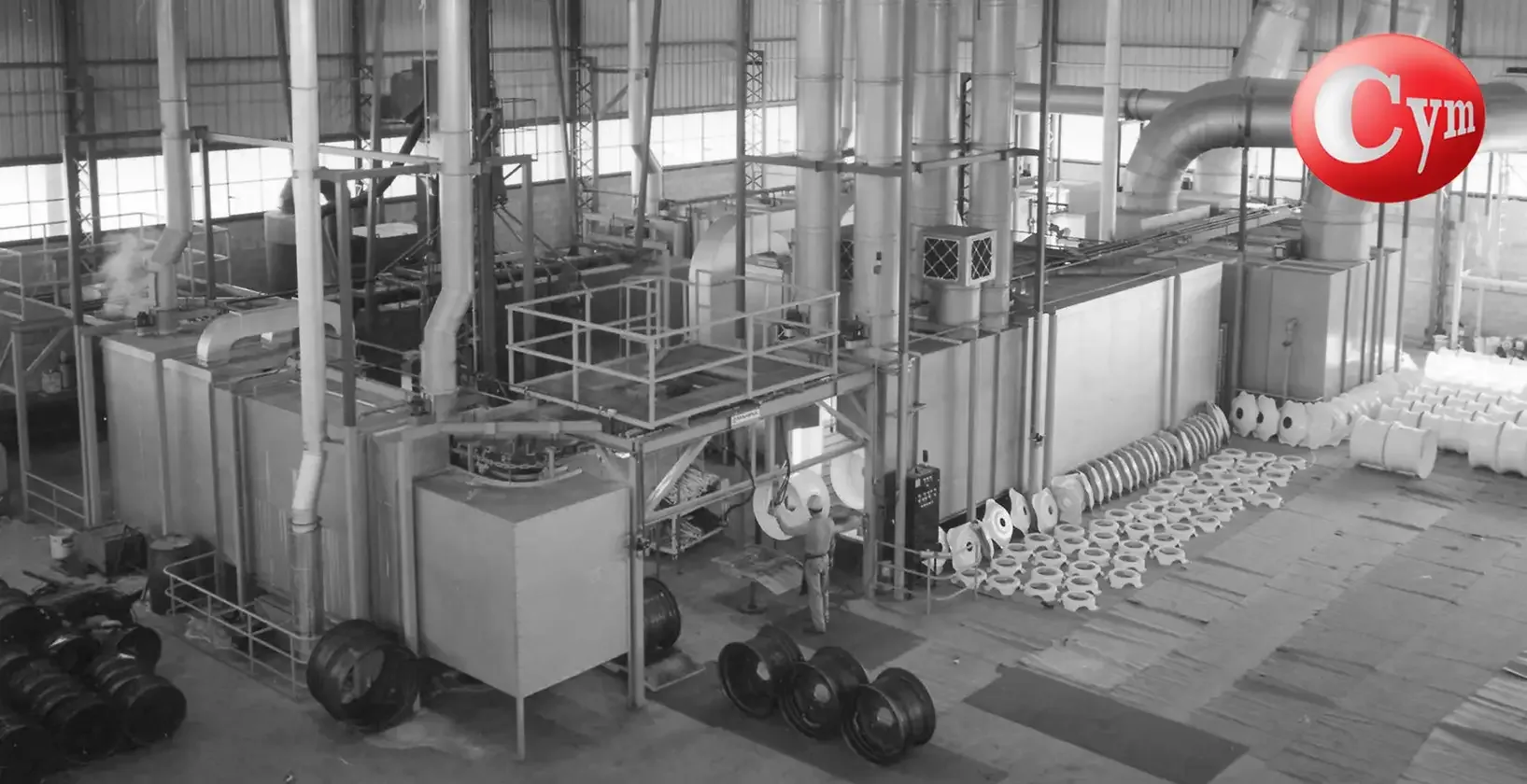 Línea automática CYM EST-TUN 15x15 – granallado, pintura y horno de curado para llantas y ruedas agrícolas e industriales – vista aérea