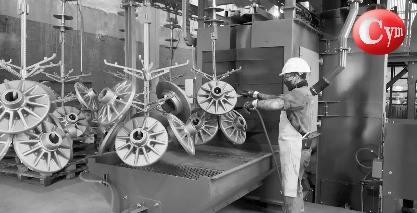 CYM TUN 8x10 continuous overhead monorail blast machine – 31" × 39" (800 × 1,000 mm) – loading and unloading of grey iron, nodular iron and cast steel castings on overhead hook conveyor